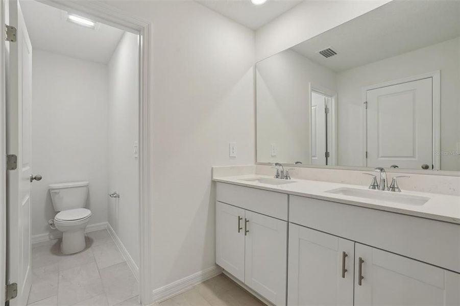 Furnished interior view inside a new home in Bradford Park, Ormond Beach (Image 9).