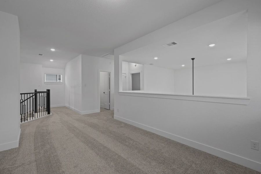 Representative unfurnished interior of a home built from the San Francisco by Chesmar Homes in The Woodlands Hills, Willis (Image 49). Representative unfurnished interior of a home built from the San Francisco by Chesmar Homes in The Woodlands Hills, Willis (Image 49).