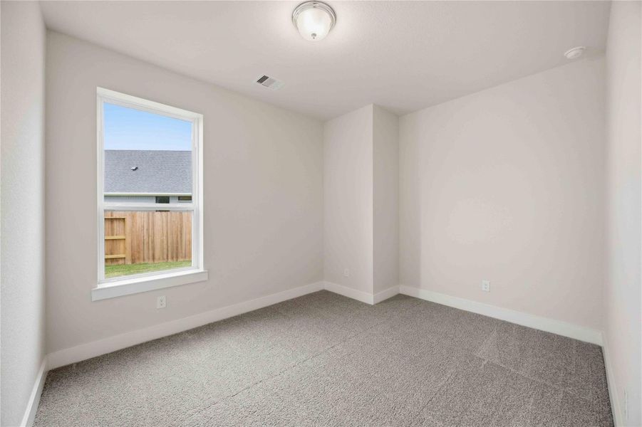 Spacious, unfurnished interior of a new home in Ellwood, Iowa Colony (Image 28).