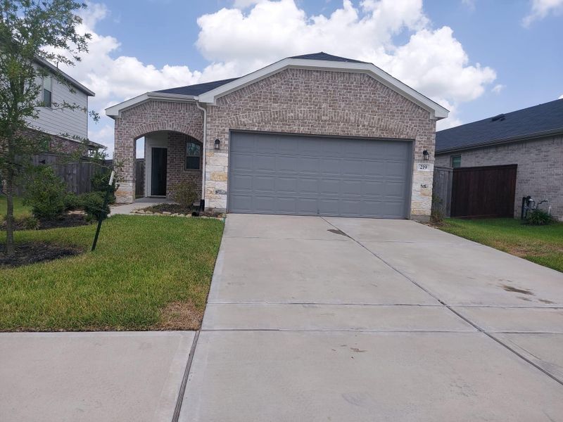 Front exterior of a new home in , Crosby, TX, highlighting curb appeal (Image 1). Front exterior of a new home in , Crosby, TX, highlighting curb appeal (Image 1).