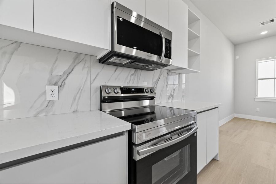 Furnished interior view inside a new home in Metro Village, Houston (Image 3). Furnished interior view inside a new home in Metro Village, Houston (Image 3).
