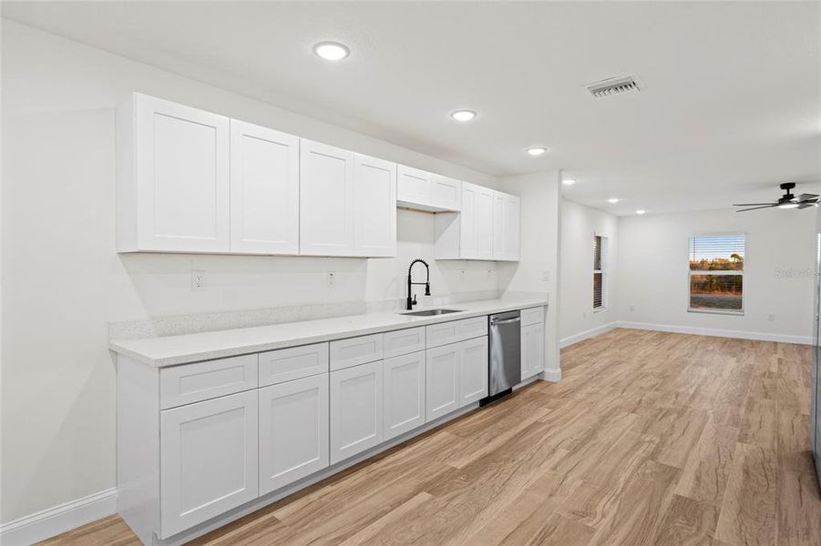 Furnished interior view inside a new home in , Okeechobee (Image 10).