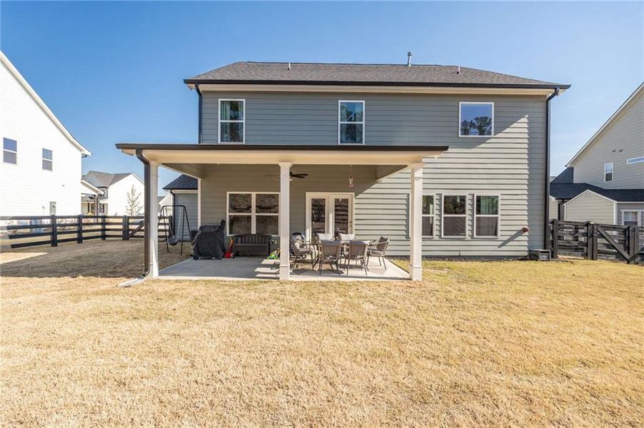 Exterior details and patio area of a home in NorthFarm at NatureWalk, Dallas (Image 25).