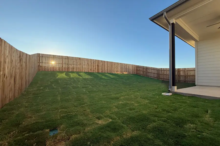 Exterior details and patio area of a home in The Grove at Blackhawk, Pflugerville (Image 3).