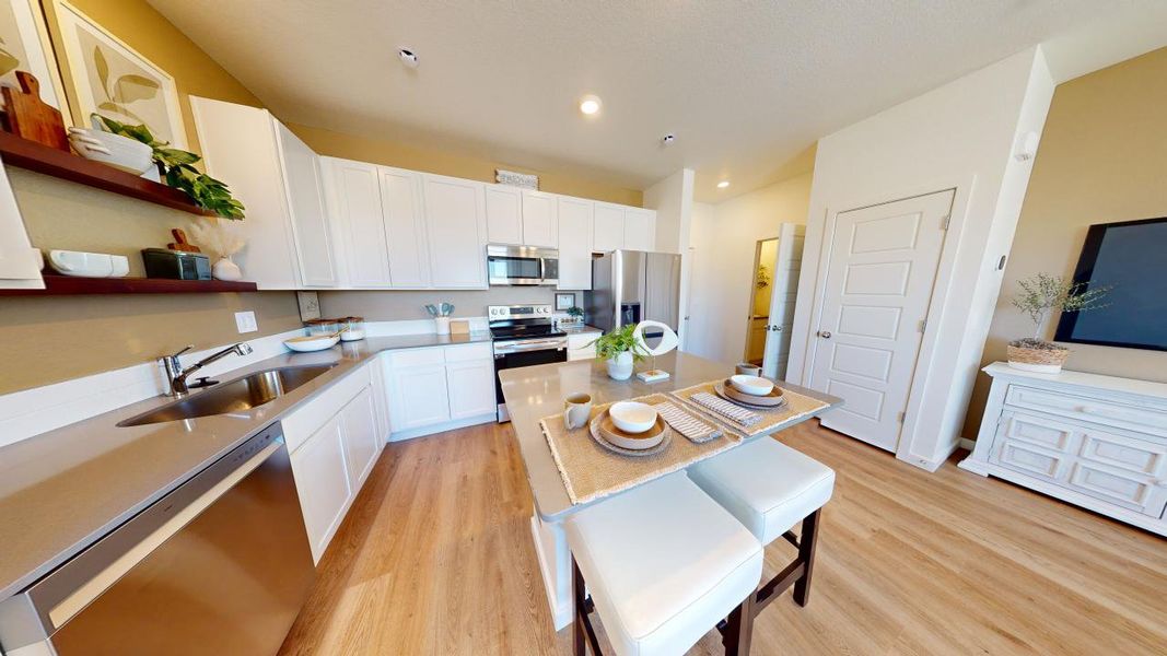Representative furnished interior of a home built from the Westcliffe by Baessler Homes in Conestoga, Ault (Image 6).