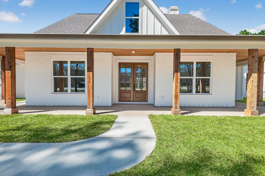 Exterior details and patio area of a home in , Splendora (Image 32).