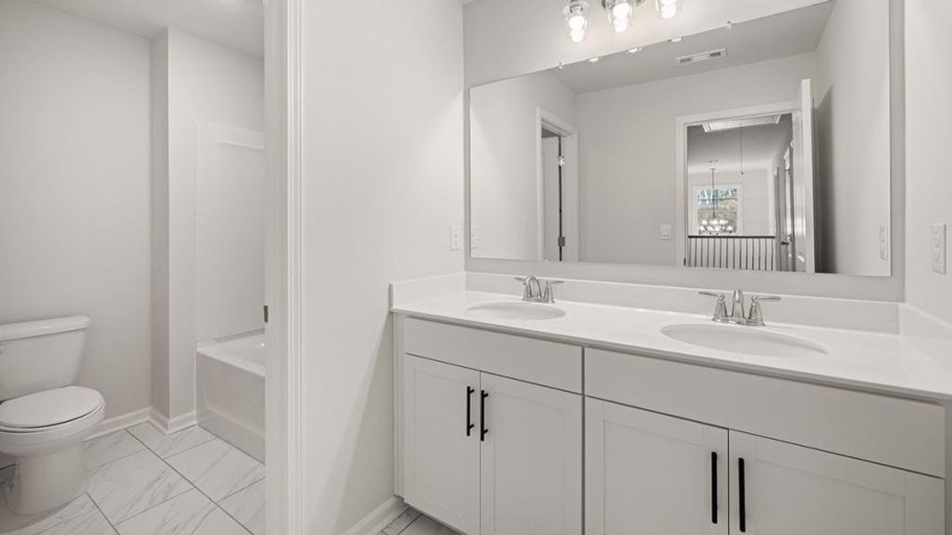 Furnished interior view inside a new home in Butner Estates, South Fulton (Image 5).