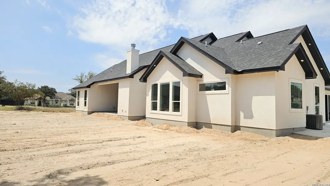 Exterior details and patio area of a home in , Adkins (Image 3).
