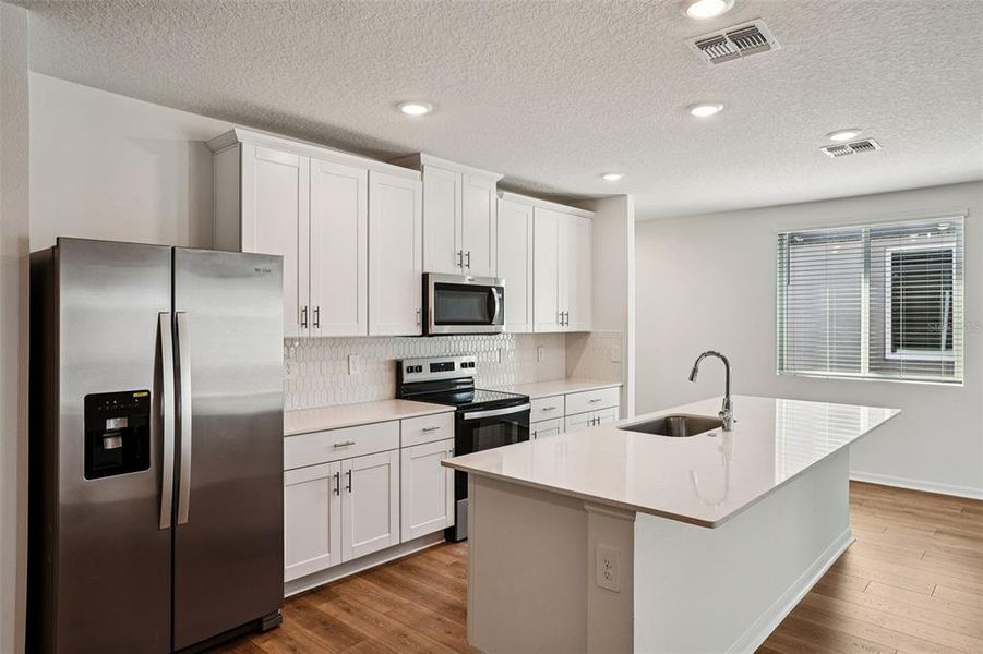 Furnished interior view inside a new home in Ridgehaven - Villas, Ormond Beach (Image 4).