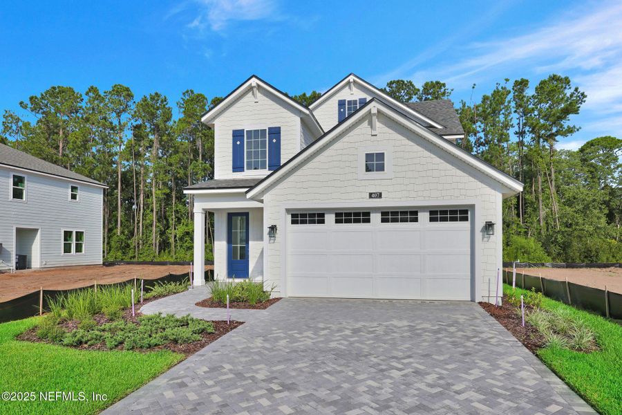 Front exterior of a new home in Reflections at Nocatee, Nocatee, FL, highlighting curb appeal (Image 25).
