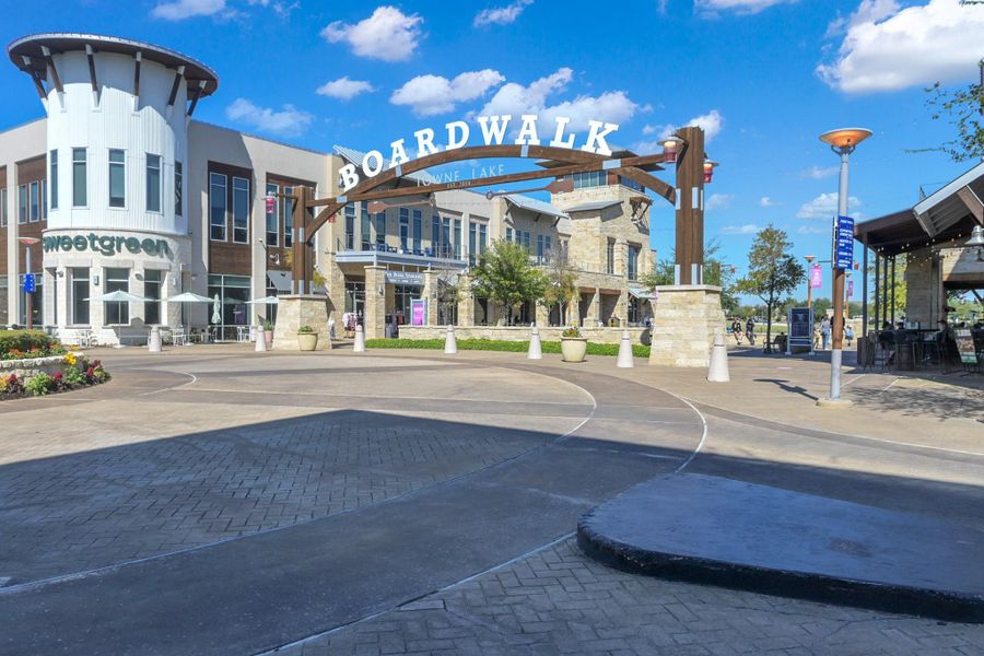 The Boardwalk features shopping and restaurants and overlooks part of Towne Lake.
