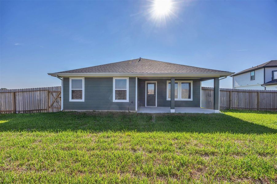 Front exterior of a new home in Westward Pointe, Sealy, TX, highlighting curb appeal (Image 19). Front exterior of a new home in Westward Pointe, Sealy, TX, highlighting curb appeal (Image 19).