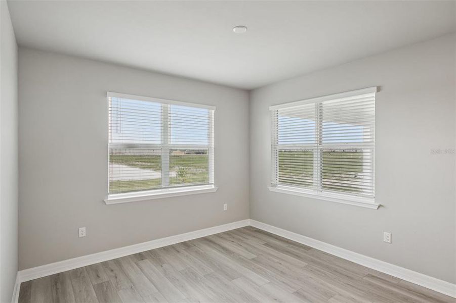 Spacious, unfurnished interior of a new home in Crescent Lakes - Signature Series, Punta Gorda (Image 31).