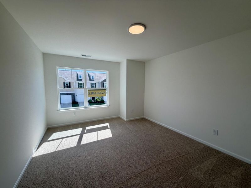 Spacious, unfurnished interior of a new home in Bellevue Townhomes, Greenville (Image 17).
