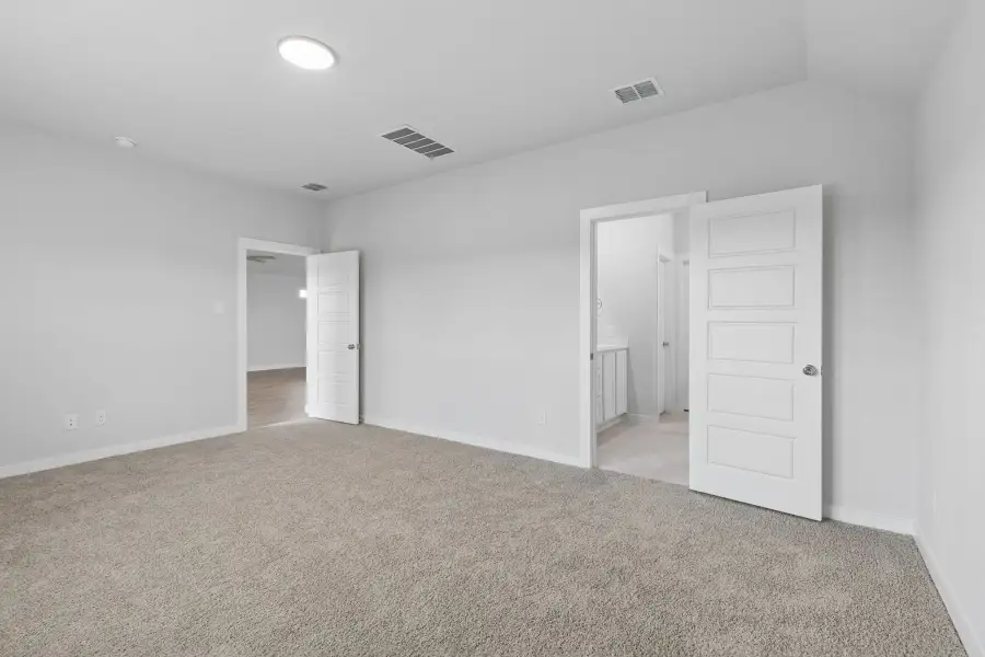 Primary Suite in the Oscar home plan by Trophy Signature Homes – REPRESENTATIVE PHOTO Primary Suite in the Oscar home plan by Trophy Signature Homes – REPRESENTATIVE PHOTO