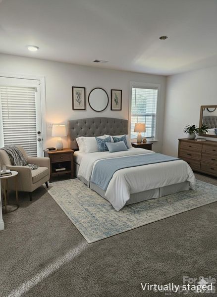 Virtually staged main level guest room w/en suite bath