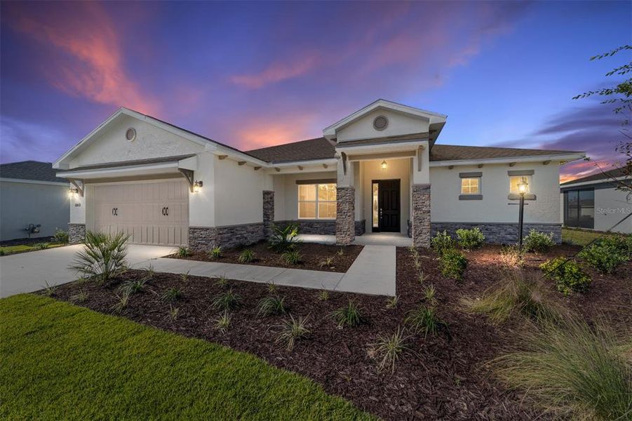 Front exterior of a new home in , Ocala, FL, highlighting curb appeal (Image 1). Front exterior of a new home in , Ocala, FL, highlighting curb appeal (Image 1).