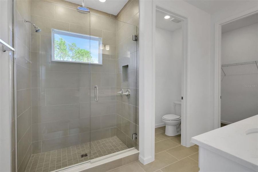 Furnished interior view inside a new home in Serenade at Ovation, Winter Garden (Image 12).