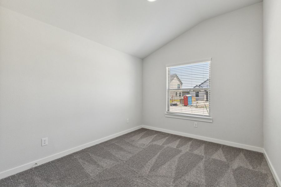 Bedroom in the Quartz home plan by Trophy Signature Homes – REPRESENTATIVE PHOTO Bedroom in the Quartz home plan by Trophy Signature Homes – REPRESENTATIVE PHOTO