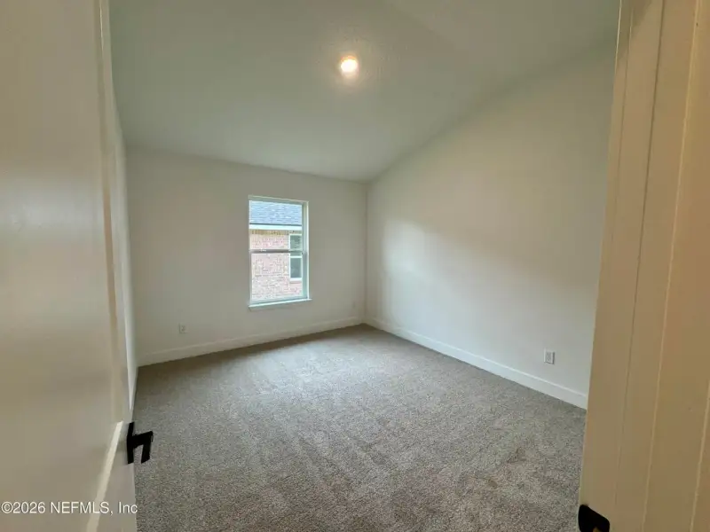 Spacious, unfurnished interior of a new home in Shadow Crest at Rolling Hills, Green Cove Springs (Image 14).