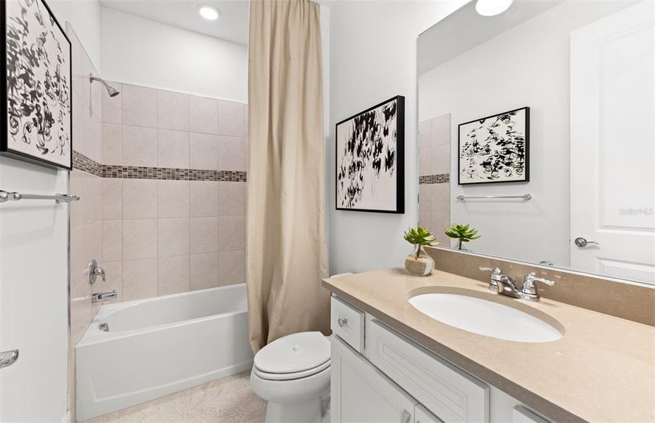 Furnished interior view inside a new home in The Strand at Cedar Grove, North Port (Image 9).