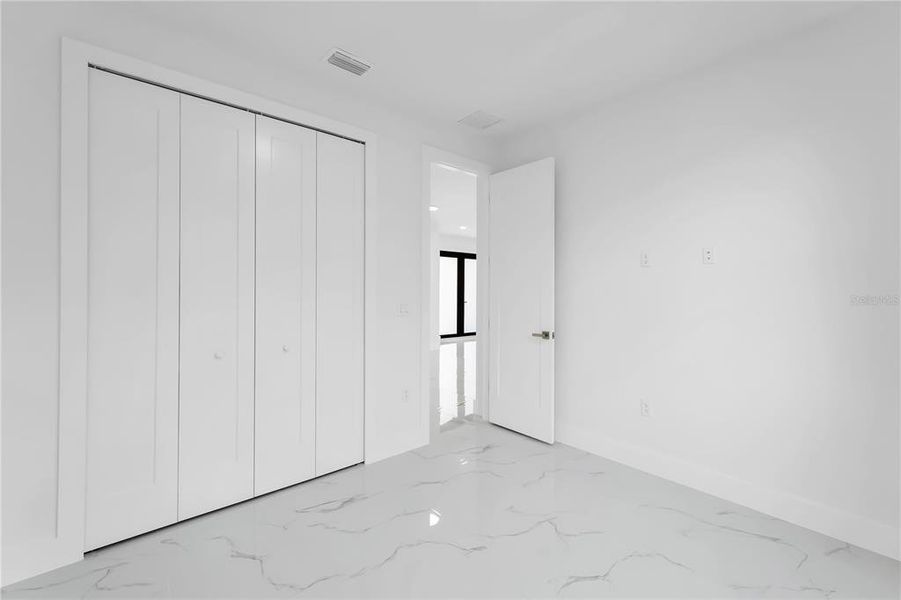 Spacious, unfurnished interior of a new home in , Port Charlotte (Image 9).