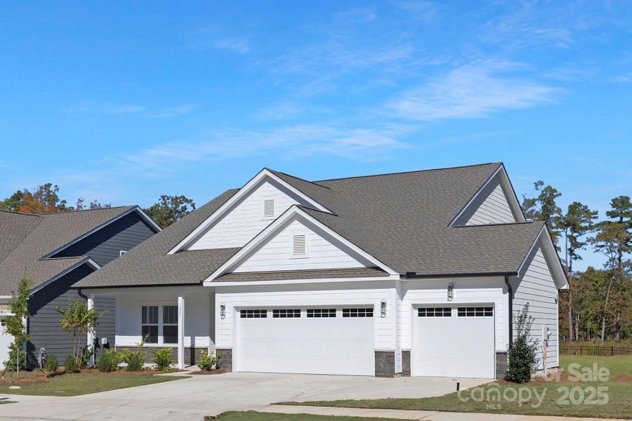 Front exterior of a new home in , Monroe, NC, highlighting curb appeal (Image 24). Front exterior of a new home in , Monroe, NC, highlighting curb appeal (Image 24).