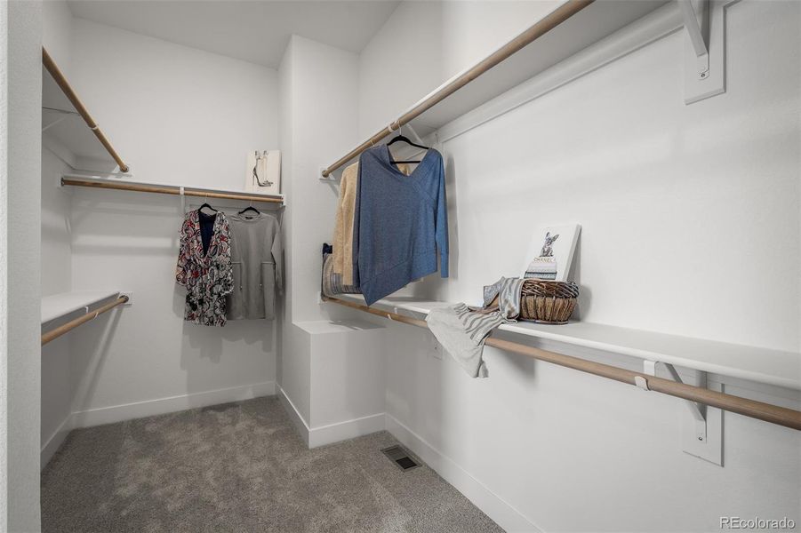 Furnished interior view inside a new home in Cloverleaf - Pinnacle Collection, Monument (Image 12).