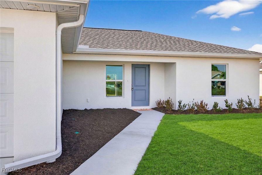 Exterior details and patio area of a home in Cape Coral, Cape Coral (Image 3).