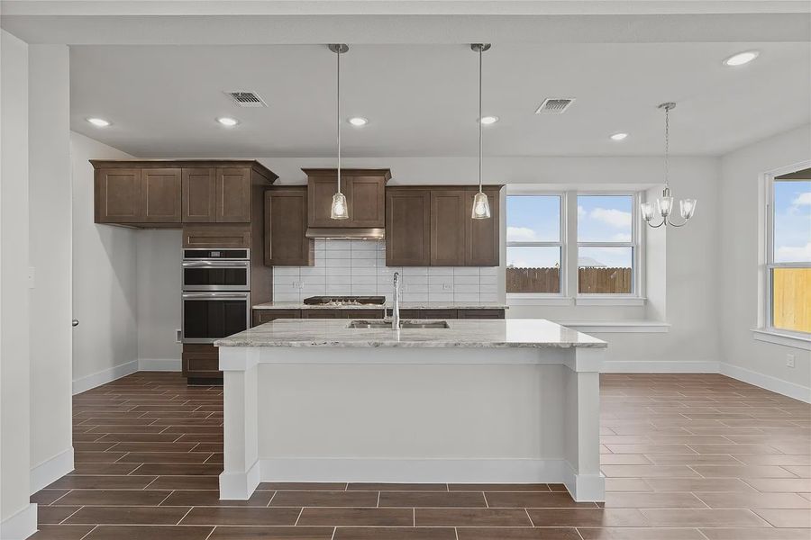 Furnished interior view inside a new home in The Grove at Blackhawk, Pflugerville (Image 6).