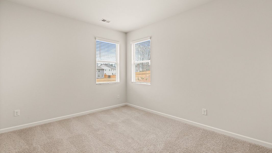 Representative unfurnished interior of a home built from the Mansfield by D.R. Horton in Northwoods at Mirror Lake, Villa Rica (Image 22).