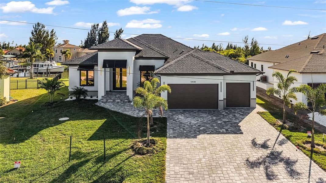 Front exterior of a new home in , Port Charlotte, FL, highlighting curb appeal (Image 23).