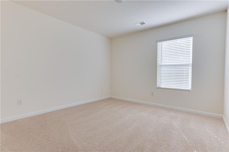 Spacious, unfurnished interior of a new home in The Reserve at Calcutta, Stockbridge (Image 24).