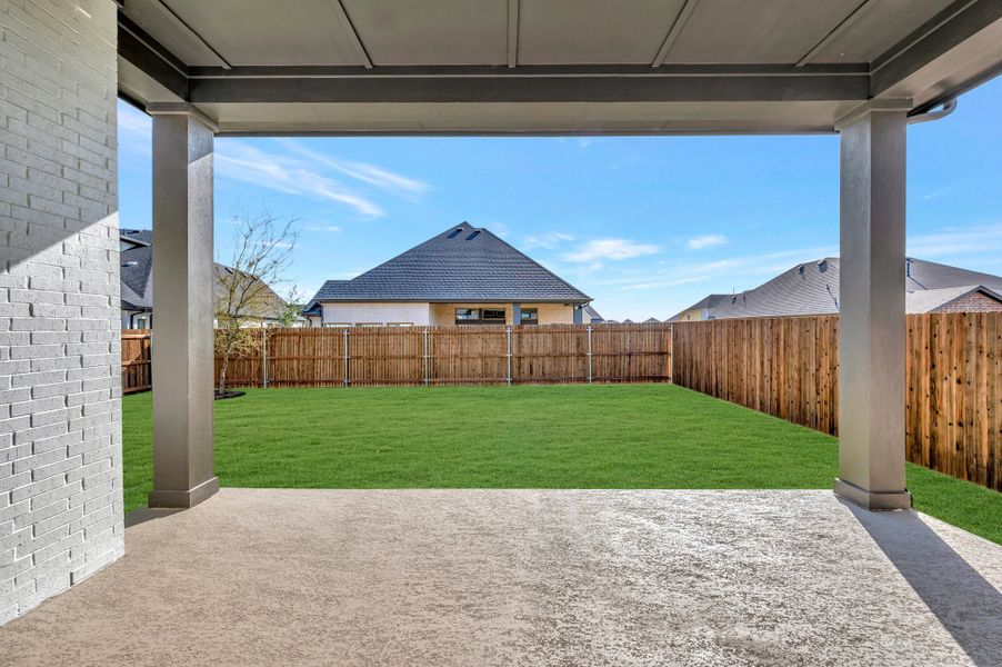 Exterior details and patio area of a home in Tavolo Park Cottages, Fort Worth (Image 3).