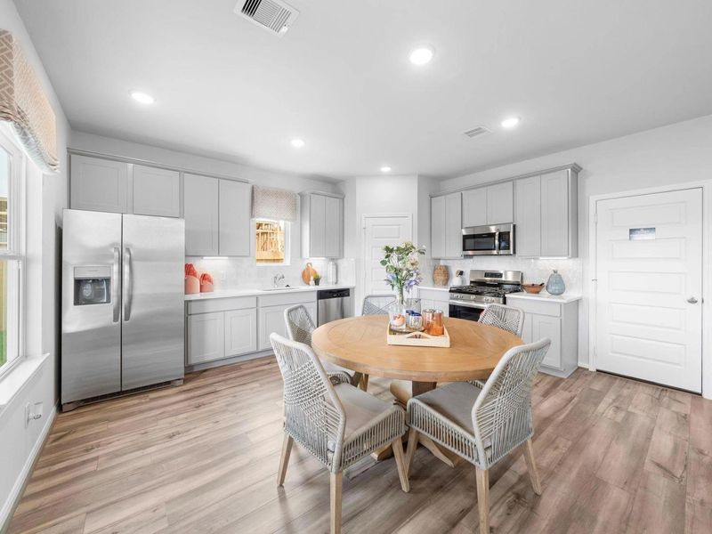 Furnished interior view inside a new home in Hill & Dale Ranch, Splendora (Image 4).