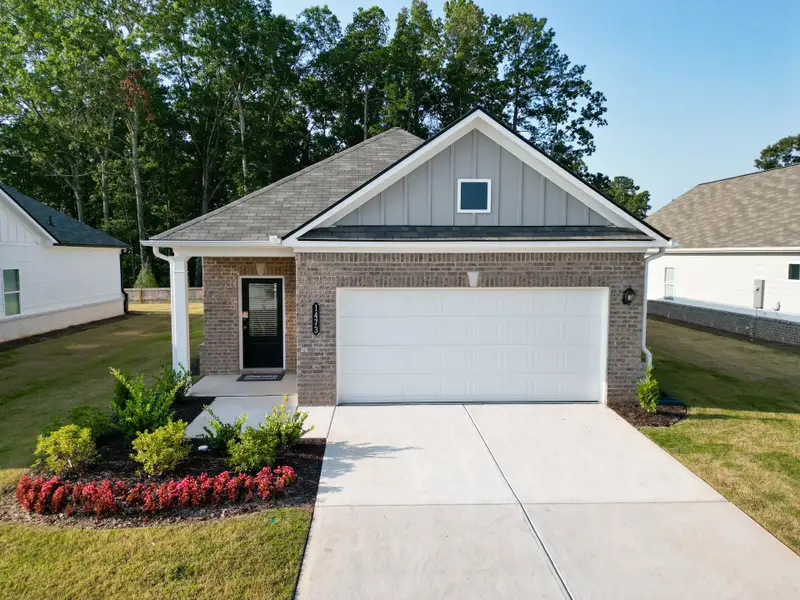 Representative exterior photo of a completed home built from the The Ryman by Smith Douglas Homes in Silo Pointe, Cartersville, GA (Image 16). Representative exterior photo of a completed home built from the The Ryman by Smith Douglas Homes in Silo Pointe, Cartersville, GA (Image 16).