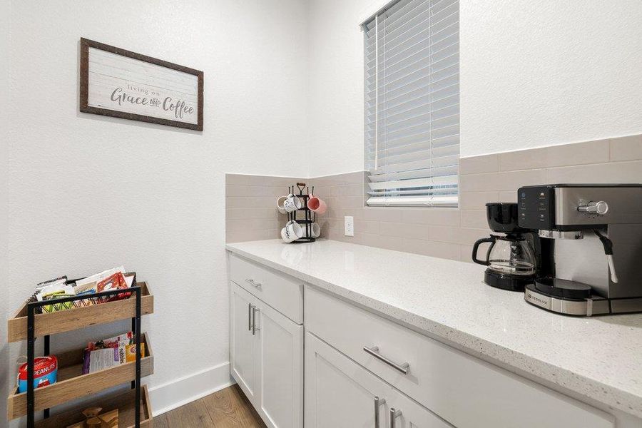 Dedicated panty bar area ideal for a coffee station and extra storage.