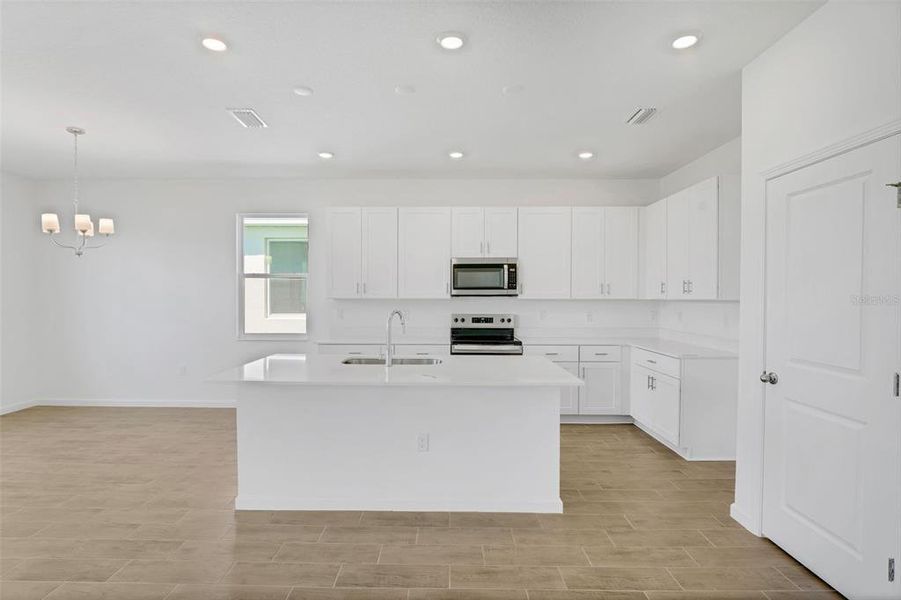 Furnished interior view inside a new home in Willowbrook North, Winter Haven (Image 12).