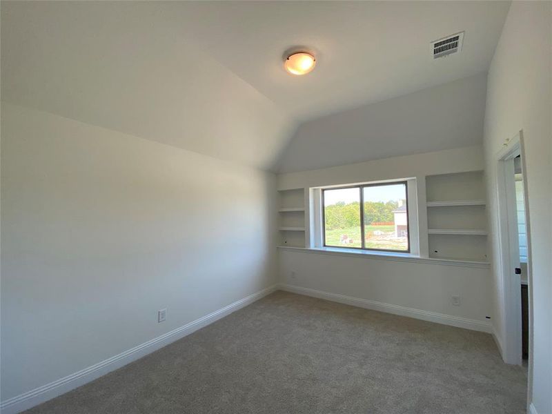 Bed #4 with vaulted ceiling & built-in shelves Bed #4 with vaulted ceiling & built-in shelves