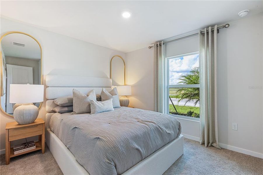 Furnished interior view inside a new home in Central Parc, North Port (Image 9).