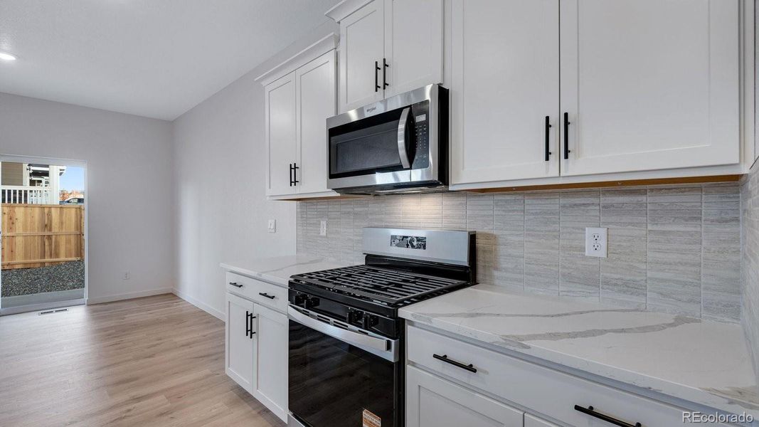 Furnished interior view inside a new home in Timberleaf, Thornton (Image 14).