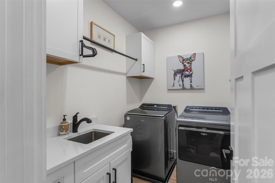 Lower level laundry with wash sink