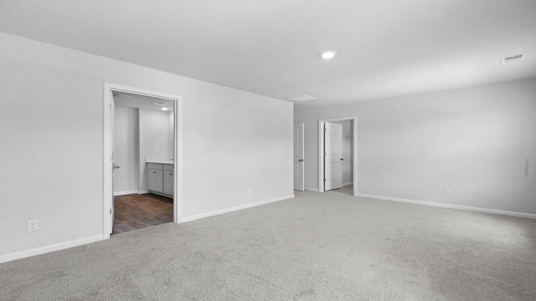 Spacious, unfurnished interior of a new home in Pine Hills at Cane Bay, Summerville (Image 17).