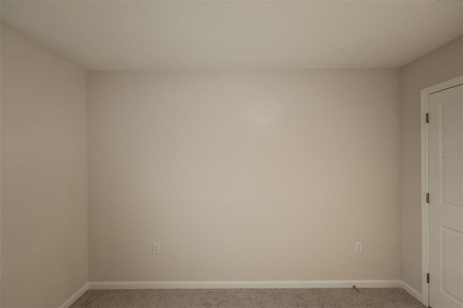 Spacious, unfurnished interior of a new home in Reeves Place, Orlando (Image 18).