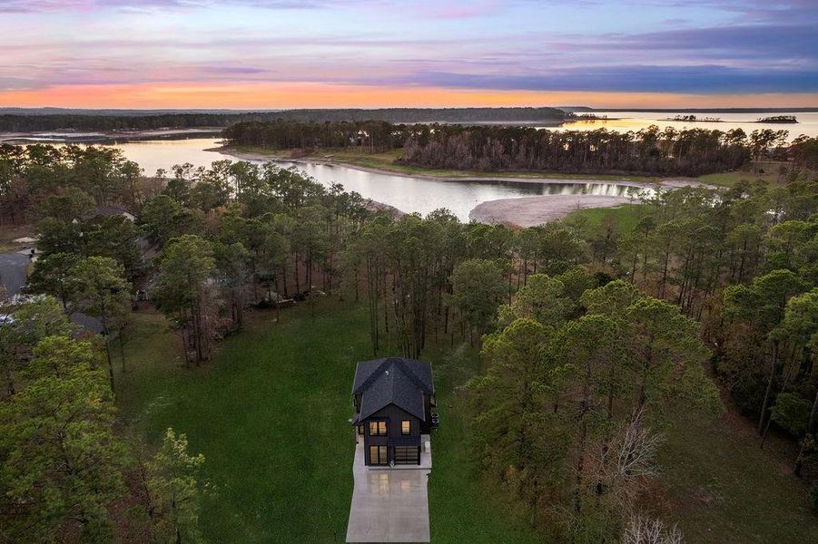Front exterior of a new home in , Brookeland, TX, highlighting curb appeal (Image 23).