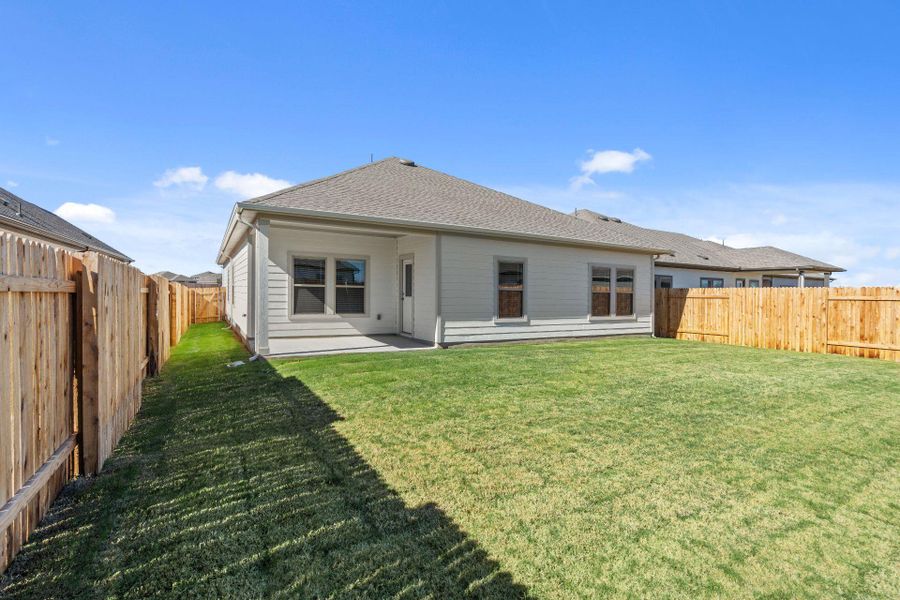 Rear of Home and Private Backyard