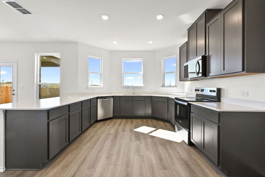 Furnished interior view inside a new home in Stoney Chase, Del Valle (Image 5).