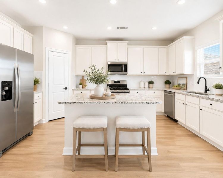 This photo of the kitchen has been virtually staged.