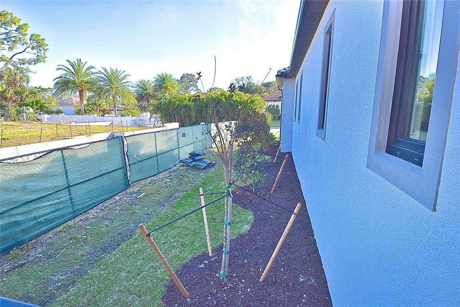 Exterior details and patio area of a home in , Nokomis (Image 39).