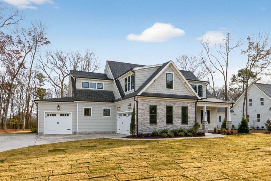 Representative exterior photo of a completed home built from the Brassfield Craftsman by Homes by Dickerson in Corbett Landing, Pittsboro, NC (Image 11).